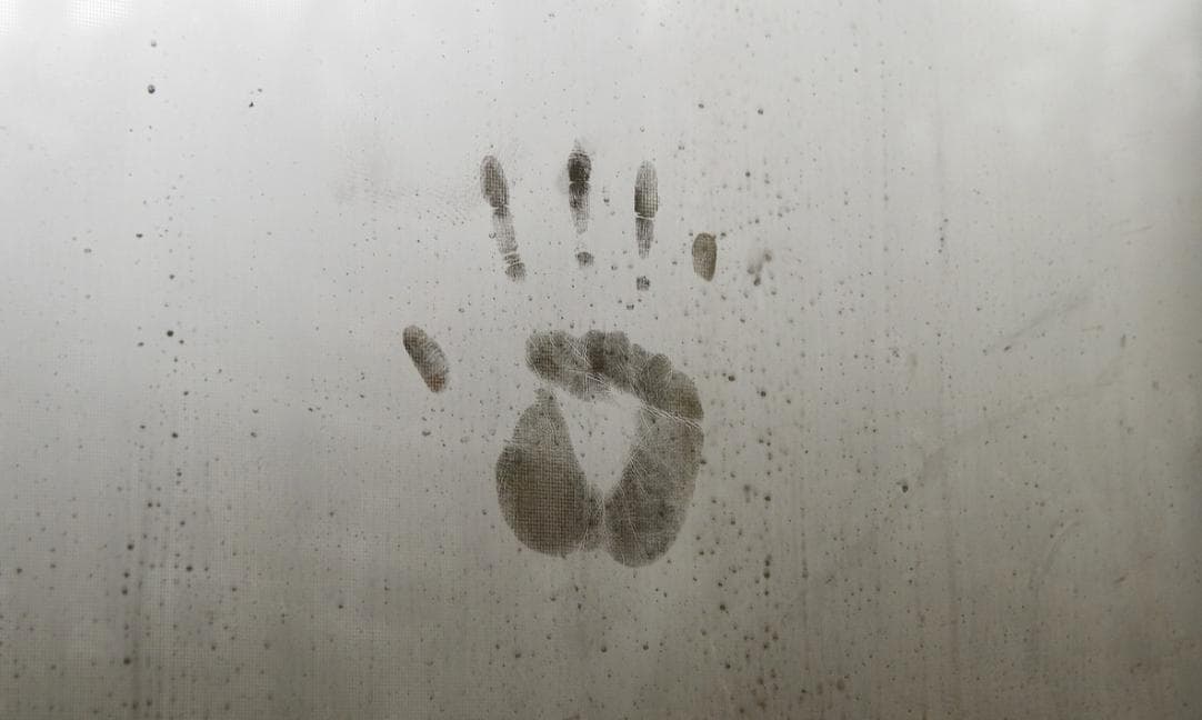 Handprint on a foggy window